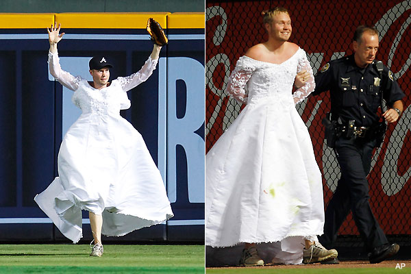 men wearing wedding dresses